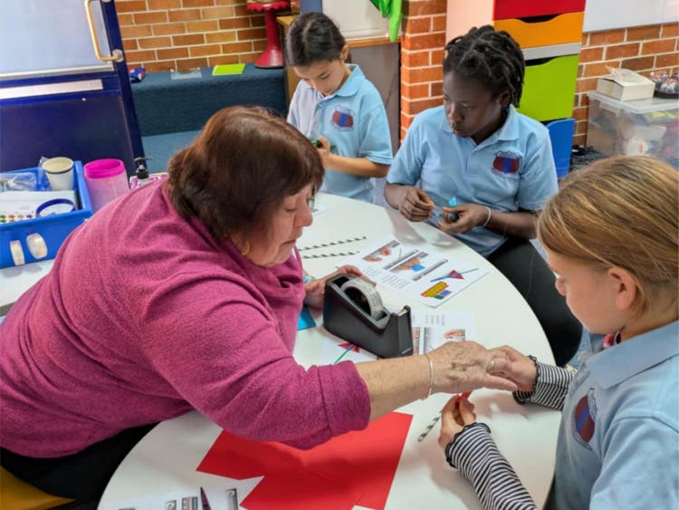 Studenst with School Learning Support Officer.