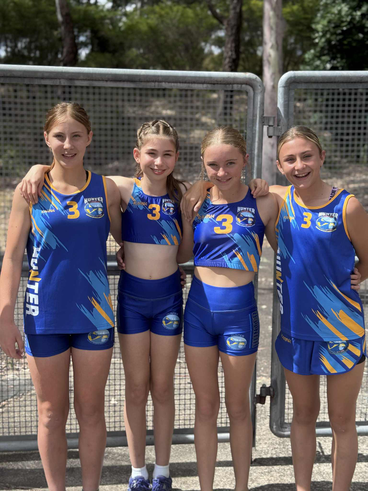 Students representing the school at State Athletics, dressed in the Hunter Regional uniform.