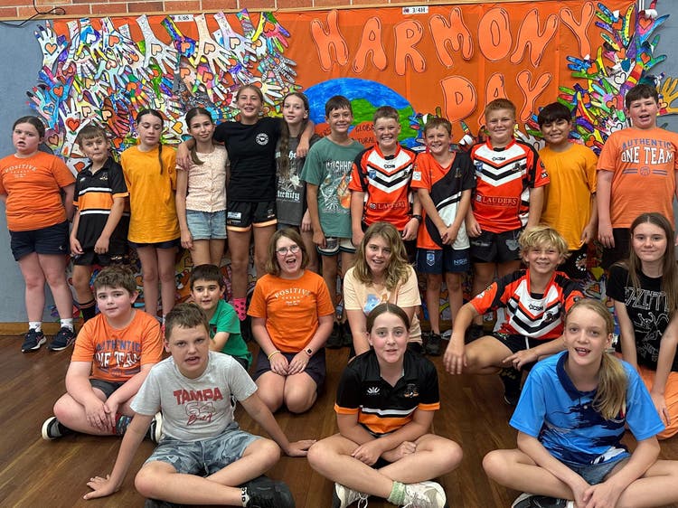 Students dressed in bright coloured clothing in support of Harmony Day.