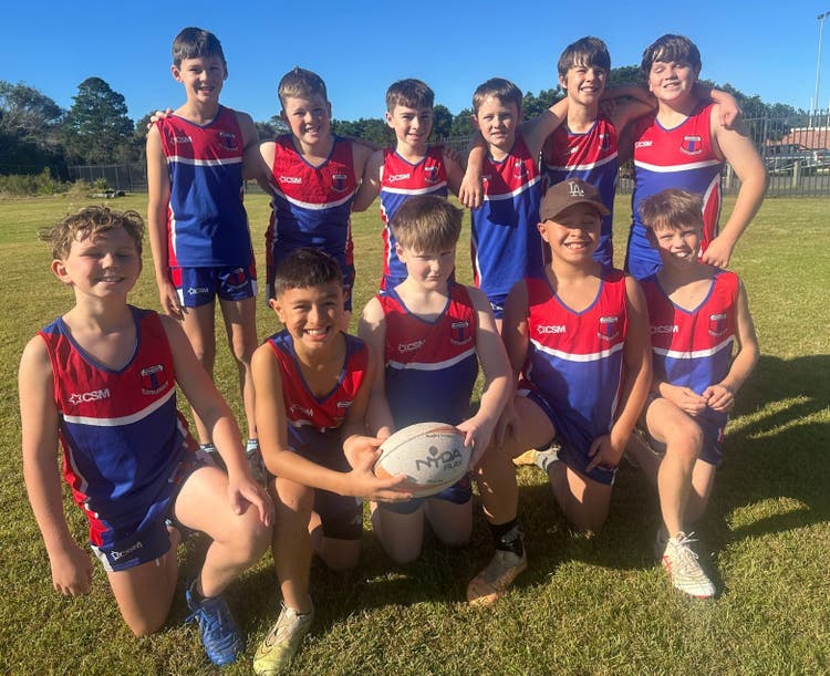 Group of students as part of the touch football team.
